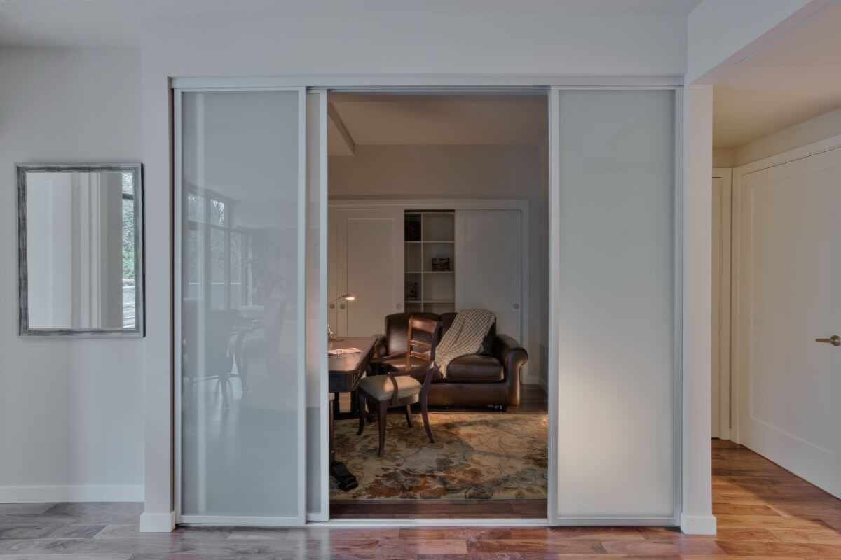 white sliding door elevating design in room