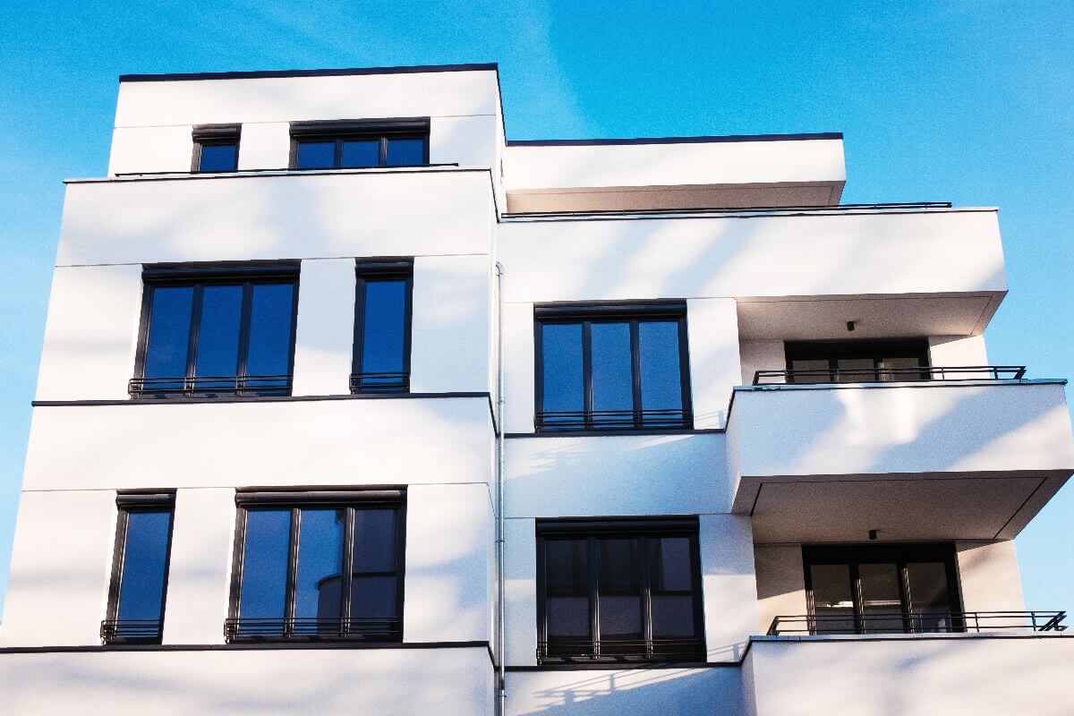 white urban home with windows for soundproofing